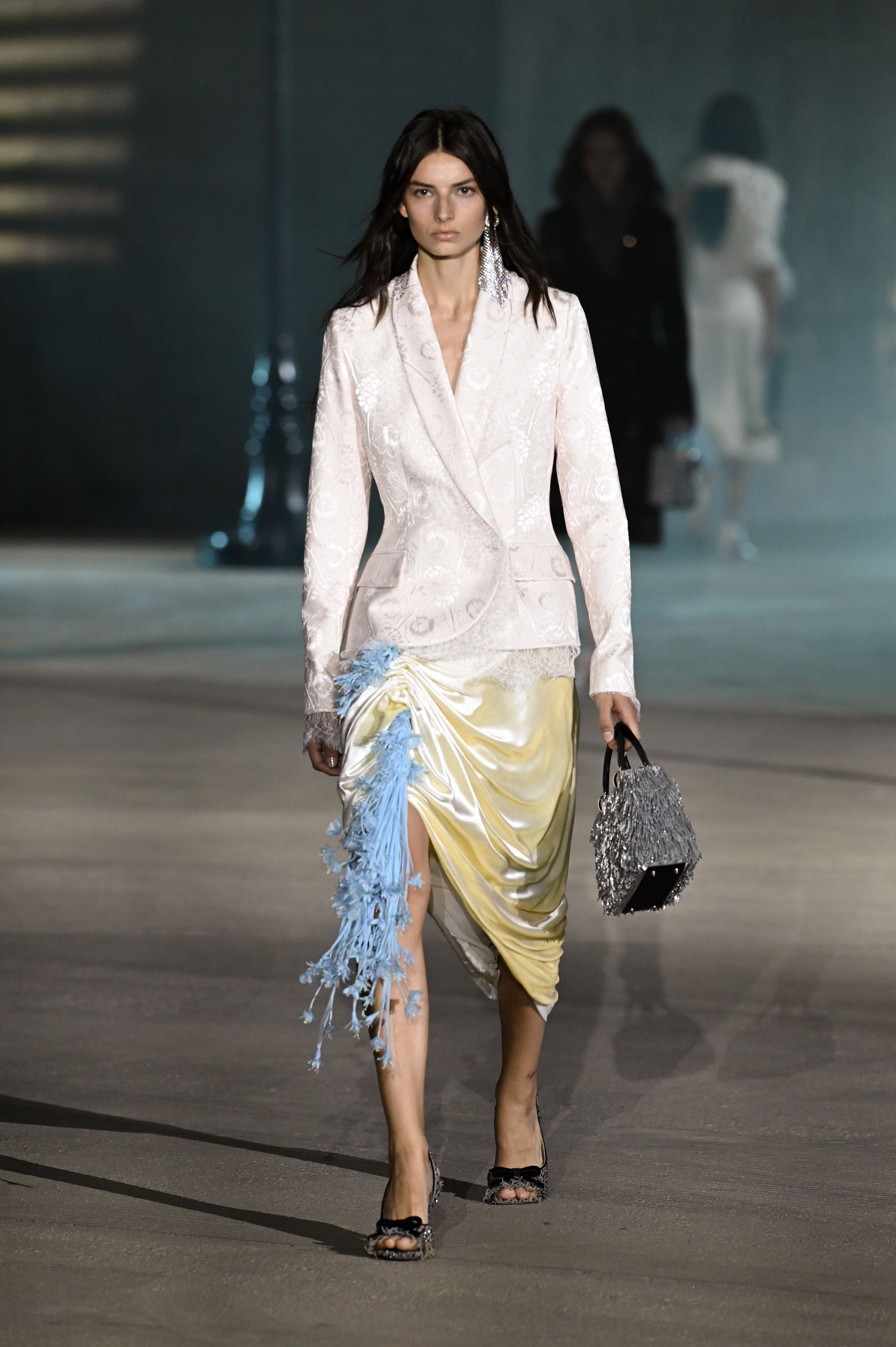 A model carried Rihanna's new Lady Dior Bag during the Cruise 2027 show