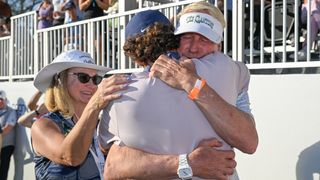 Luke Clanton embraces his family after securing his PGA Tour card at the Cognizant Classic