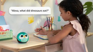 A child talking to an Amazon Echo with Alexa Plus about dinosaurs