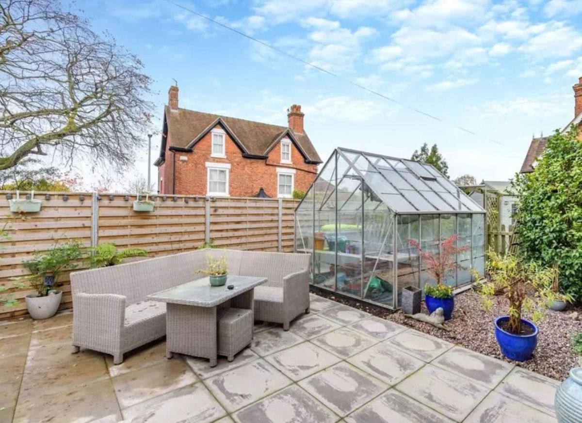 A wooden panelled garden fence