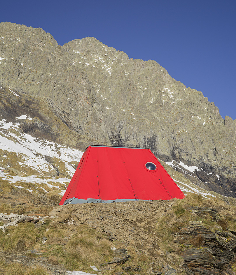 Aldo Frattini Bivouac, a little red mountain shelter in the pre-Alpine regions of Italy