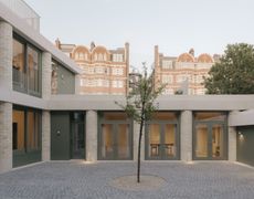 20 Newcourt Street, by Wendover, a london development of old and new with round columns and brick frontage