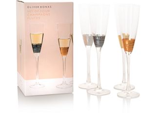 Mixed metallic set of four champagne glasses
