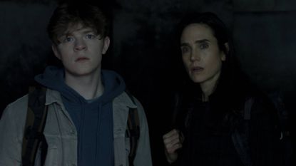 L to R: Charlie (Oakes Fegley) and Daniela (Jennifer Connelly) look out into the unknown in Dark Matter season 2