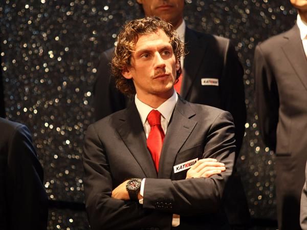 Filippo Pozzato does his best to look attentive.