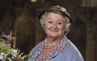 Mrs McCarthy (Sorcha Cusack) is taken hostage in Father Brown
