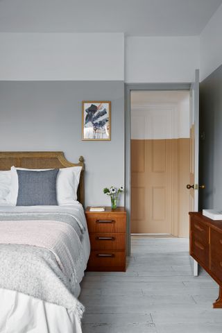 Grey and white bedroom with mid century modern furniture