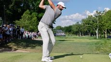 Scottie Scheffler takes a tee shot at the PGA Championship