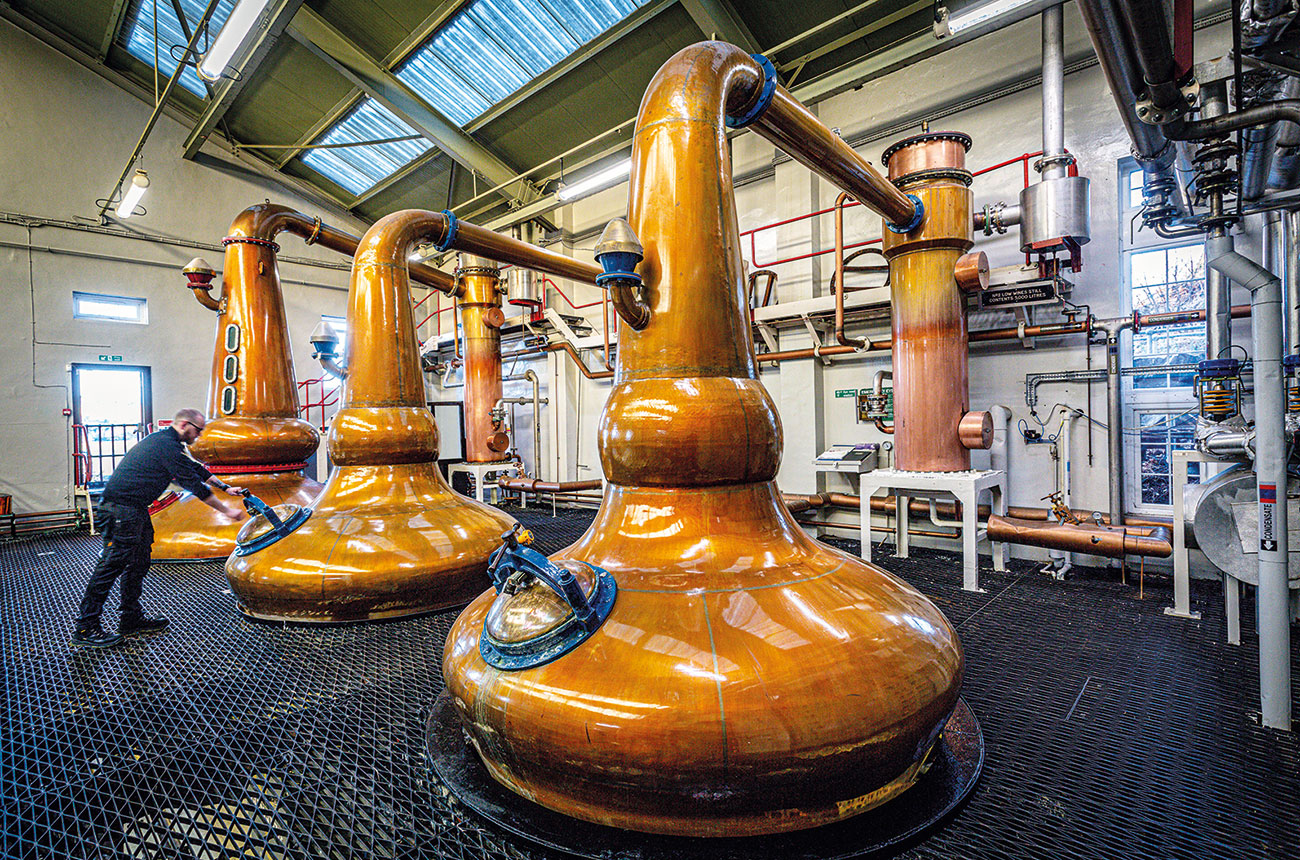 swan neck of a still at a distillery