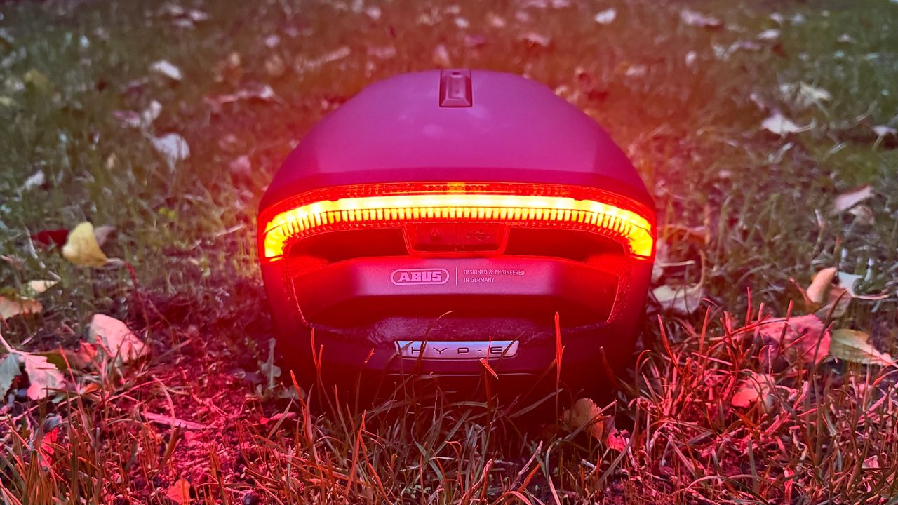 The Abus Hyp-E helmet with rear light turned on
