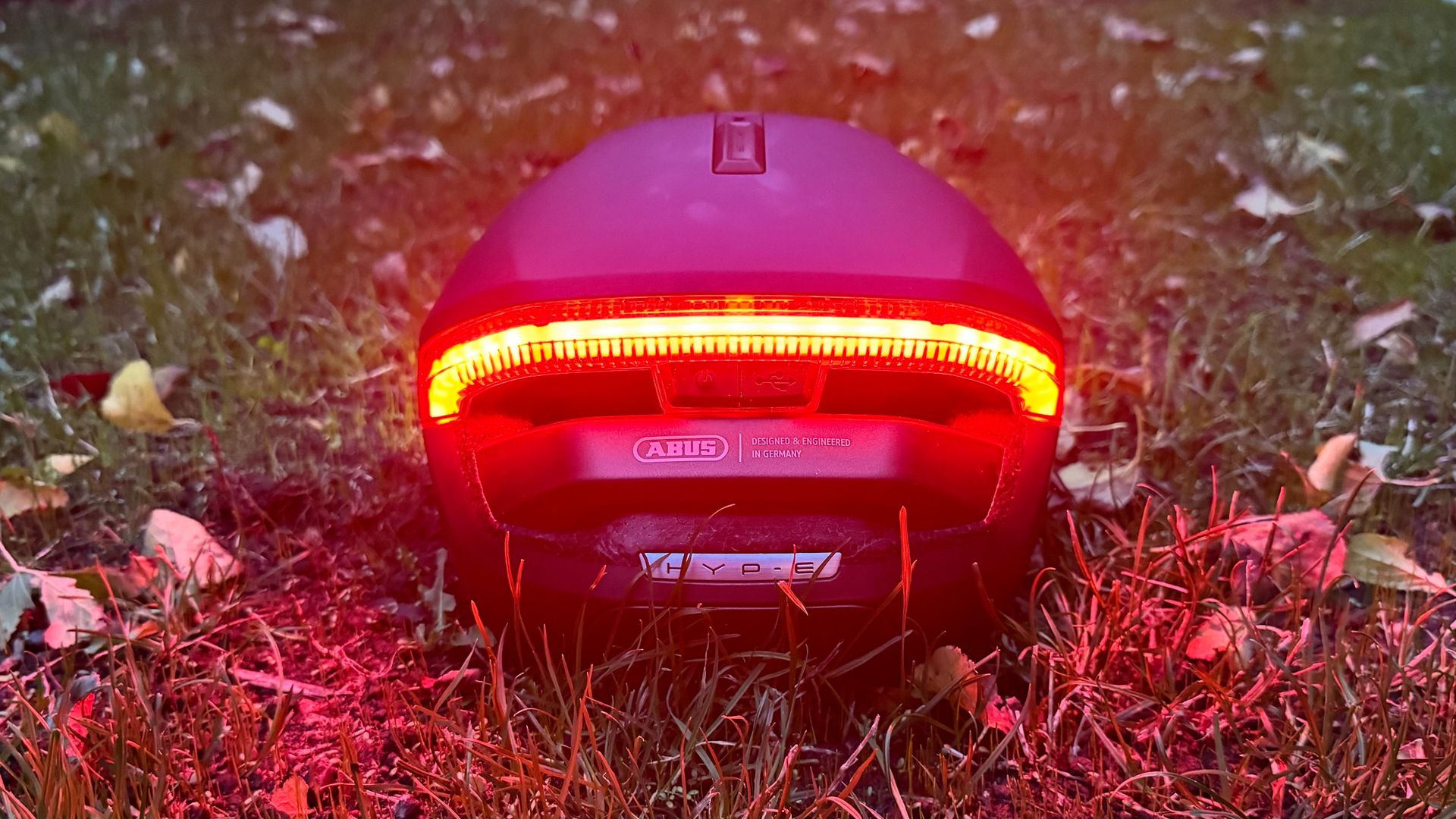 The Abus Hyp-E helmet with rear light turned on