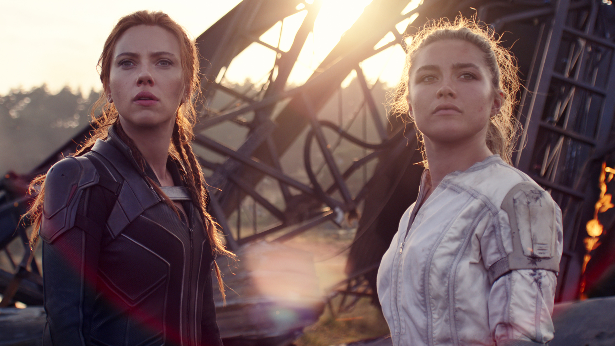 Natasha Romanoff (Scarlet Johansson) and Yelena Belova (Florence Pugh) look ahead in Black Widow.