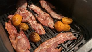 Perfectly crispy bacon sizzling in an air fryer