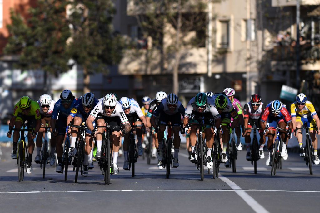 ROQUETAS DE MAR SPAIN FEBRUARY 14 Arrival Sprint Giacomo Nizzolo of Italy and Team Team Qhubeka Assos Florian Senechal of France and Team Deceuninck QuickStep Martin Laas of Estonia and Team BORA hansgrohe during the 34th Clsica de Almeria 2021 a 1833km race from Pueblo de Vicar to Roquetas de Mar ClasicaAlmeria21 on February 14 2021 in Roquetas de Mar Spain Photo by Tim de WaeleGetty Images