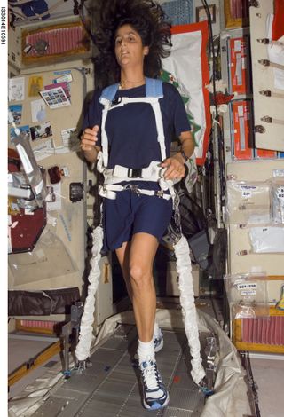 Astronaut Sunni Williams runs on the first treadmill installed on the International Space Station (ISS). This model inspired the current treadmill aboard the ISS, named COLBERT, which helps space crew members maintain bone, muscle, and cardiovascular conditioning. The treadmill was named after comedian and talk-show host Stephen Colbert.