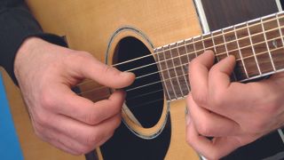 Acoustic Guitar being played 