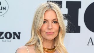 Sienna Miller pictured wearing a rosy lipstick at the US Premiere Of "Horizon: An American Saga - Chapter 1" at Regency Village Theatre on June 24, 2024 in Los Angeles, California.