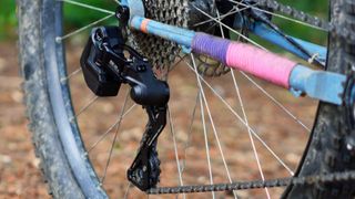 Wheeltop EDS-OX YQ electronic MTB derailleur fitted to a blue bike