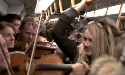 In Copenhagen, dozens of professional musicians delight tired subway commuters with a surprise performance of a classic piece of music.