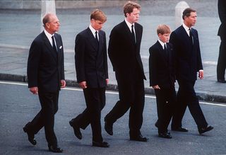 Prince Philip, the Duke of Edinburgh, Prince William, Earl Spencer, Prince Harry and Prince Charles, the Prince of Wales follow the coffin of Diana, Princess of Wales, London, England, September 6, 1997. The funeral took place seven days after she was killed in an automobile accident in Paris. Members of the royal family walked in the procession behind the coffin, as did 500 representatives of the charities associated with the Princess. At least a million people lined the streets of central London to watch the procession from Kensington Palace to Westminster Abbey. (Photo by Anwar Hussein/Getty Images)