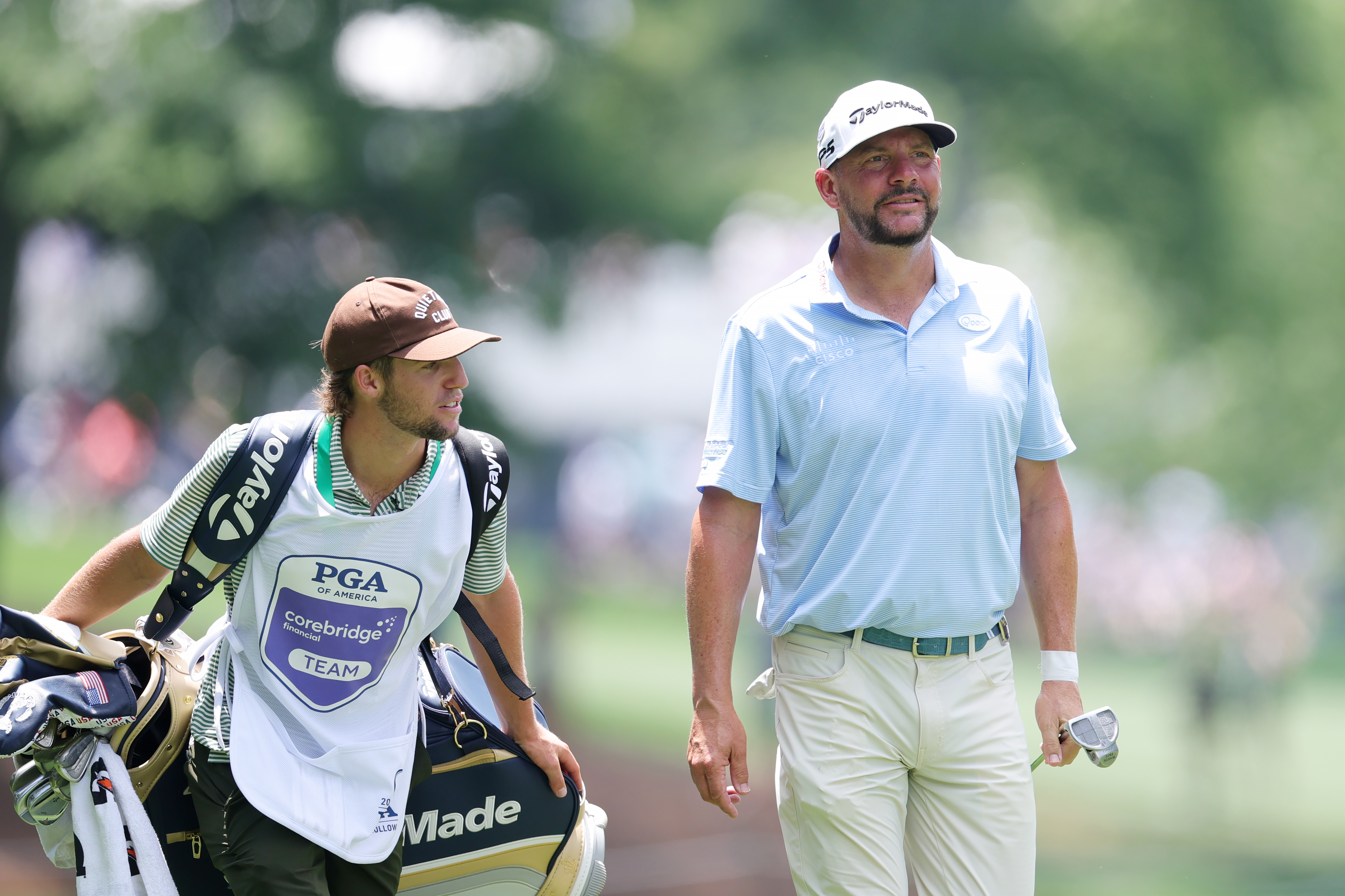 Michael Block stands next to his caddie