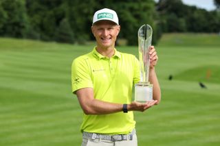 Adrian Meronk holds the Irish Open trophy