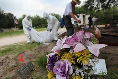 Researchers discover remains of would-be immigrants haphazardly buried in mass graves