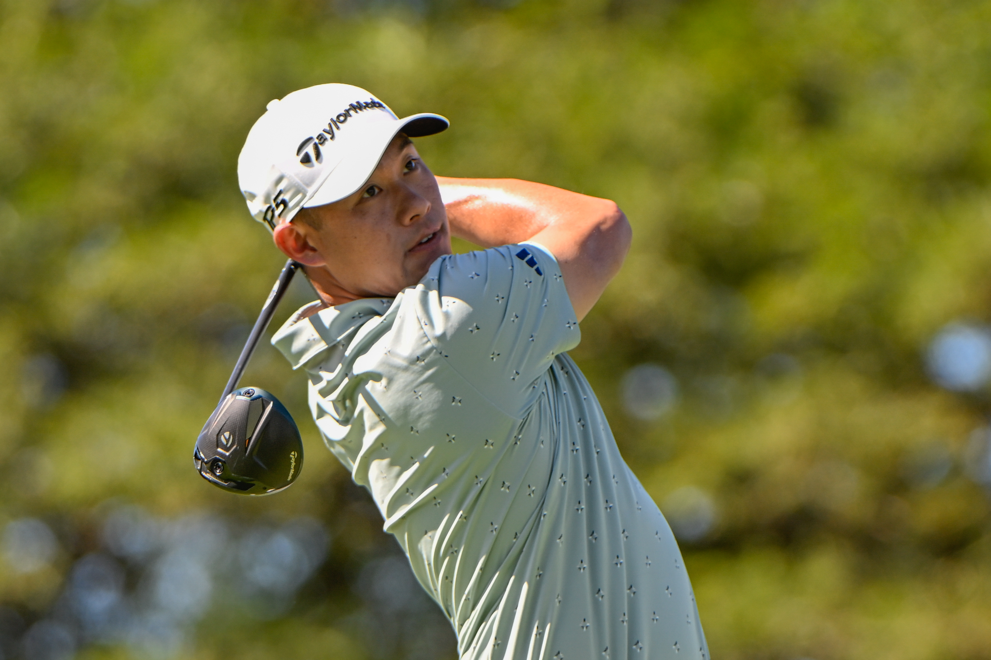 Collin Morikawa hits a tee shot