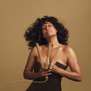 Tracee Ellis Ross with the Pattern Beauty curling iron and its three attachments