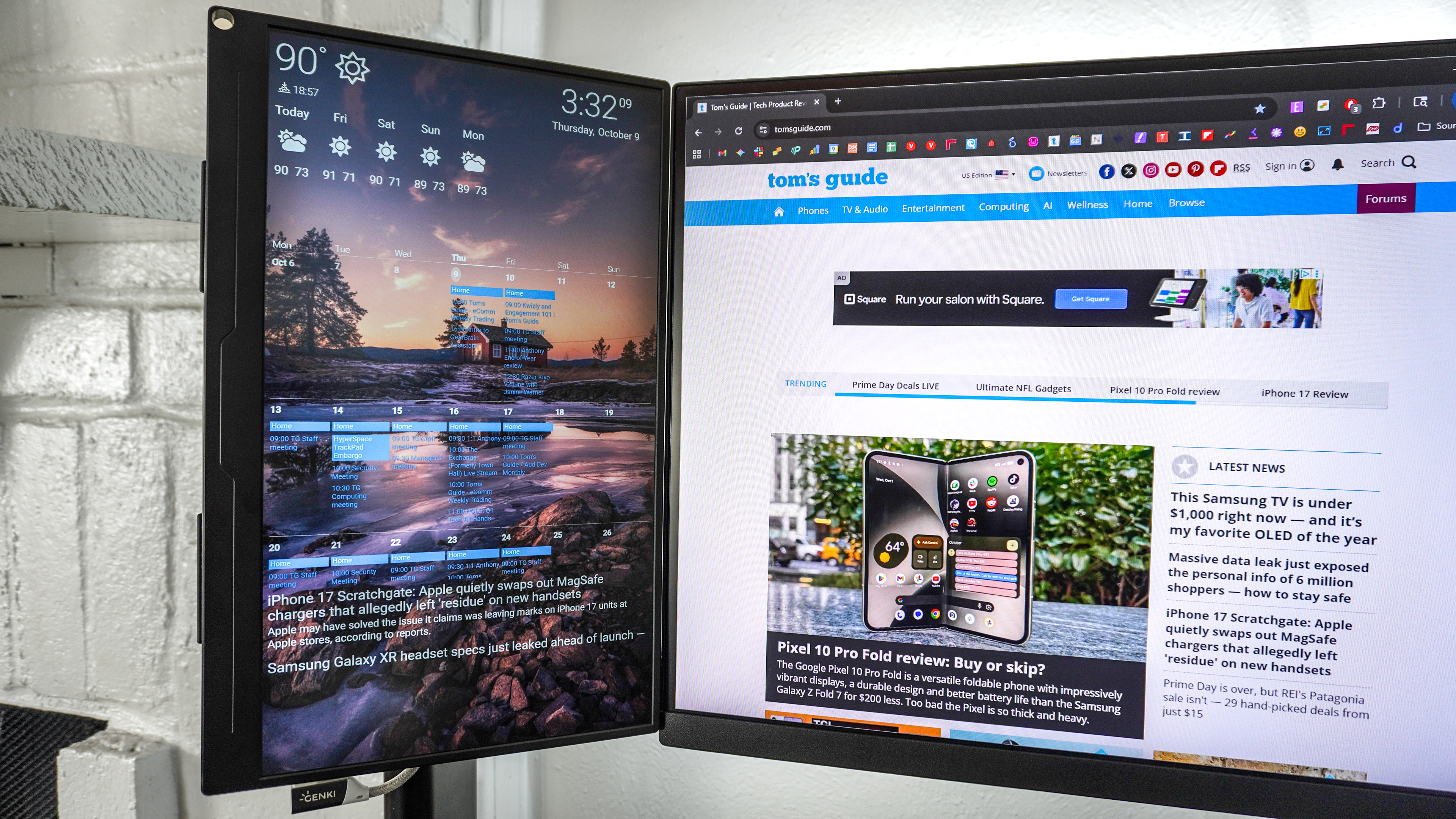 A digital dashboard made using Dakboard open on a portable monitor mounted next to an ultrawide display
