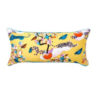 Lumbar throw pillow in yellow with floral elements
