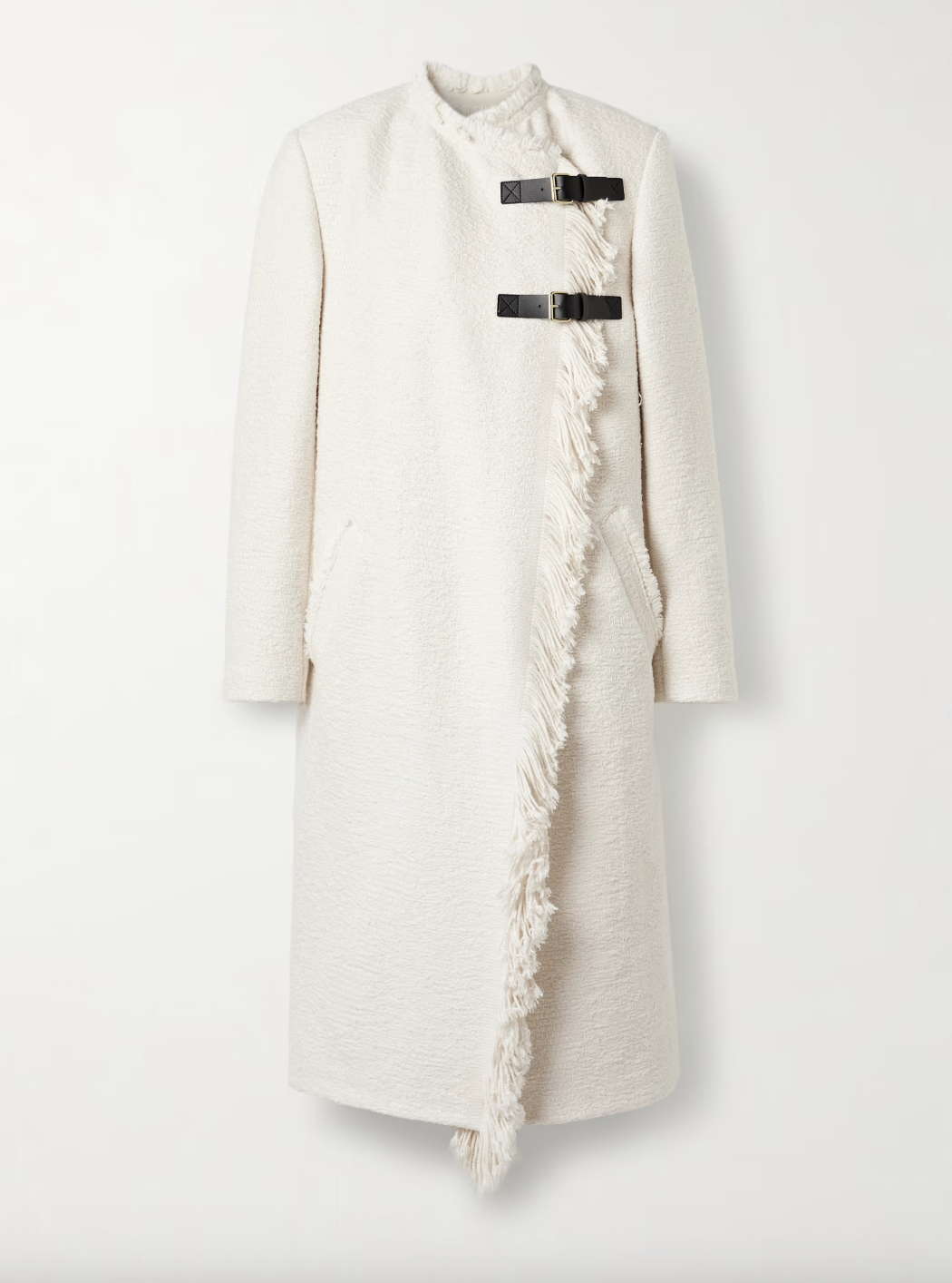 an isabel marant coat in front of a plain backdrop