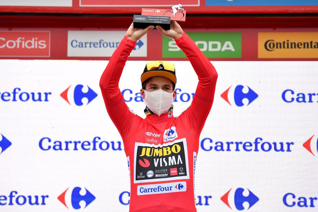 CIUDADRODRIGO SPAIN NOVEMBER 06 Podium Primoz Roglic of Slovenia and Team Jumbo Visma Red Leader Jersey Celebration Trophy during the 75th Tour of Spain 2020 Stage 16 a 162km stage from Salamanca to Ciudad Rodrigo lavuelta LaVuelta20 La Vuelta on November 06 2020 in Ciudad Rodrigo Spain Photo by Justin SetterfieldGetty Images