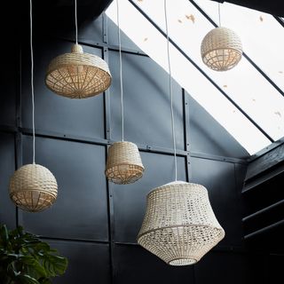 pendant lamps with handmade bamboo shade and house plants