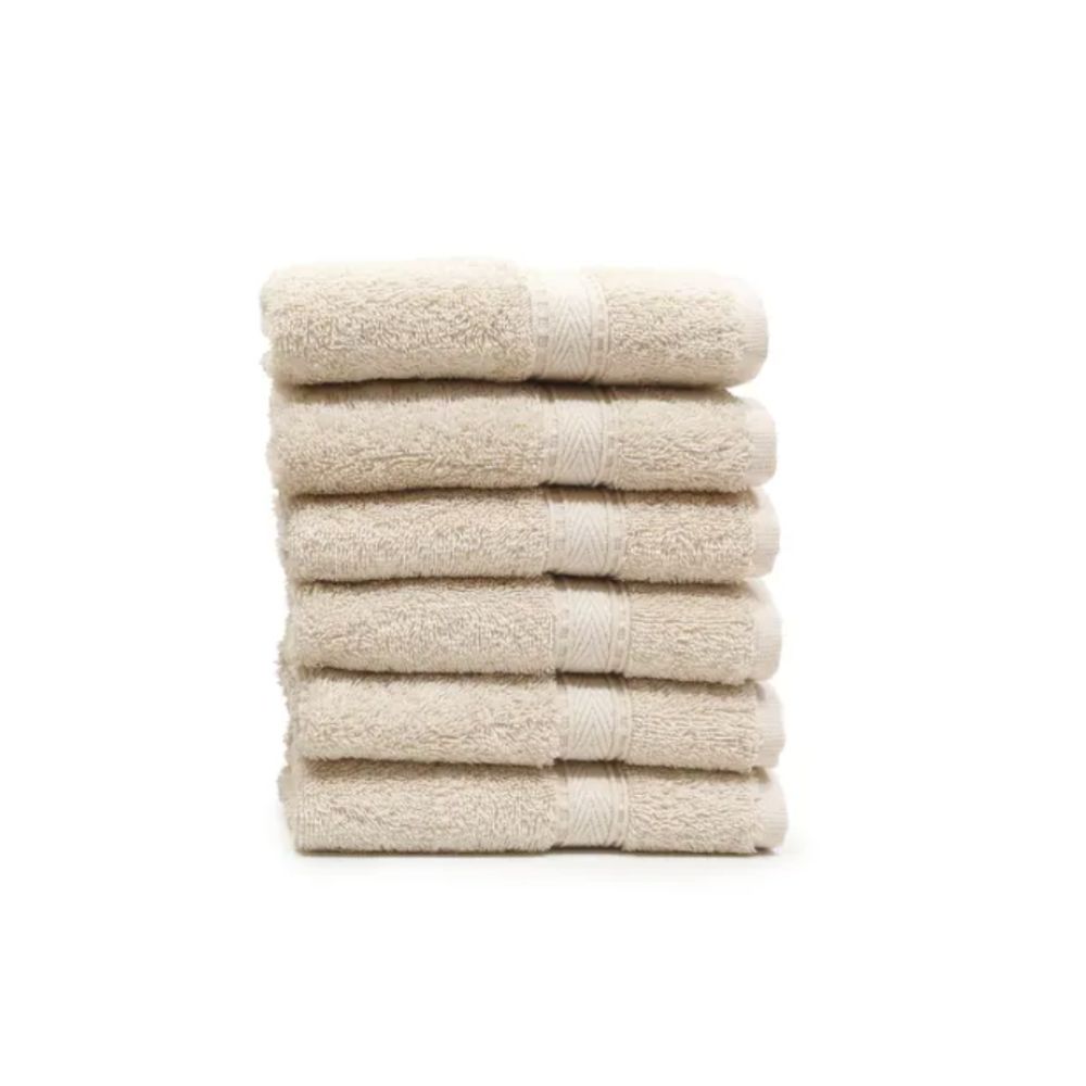 Set of six folded beige washcloths