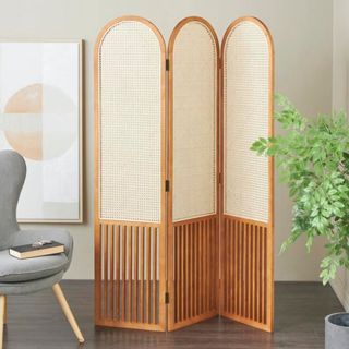 A wood and rattan dividing screen from Wayfair