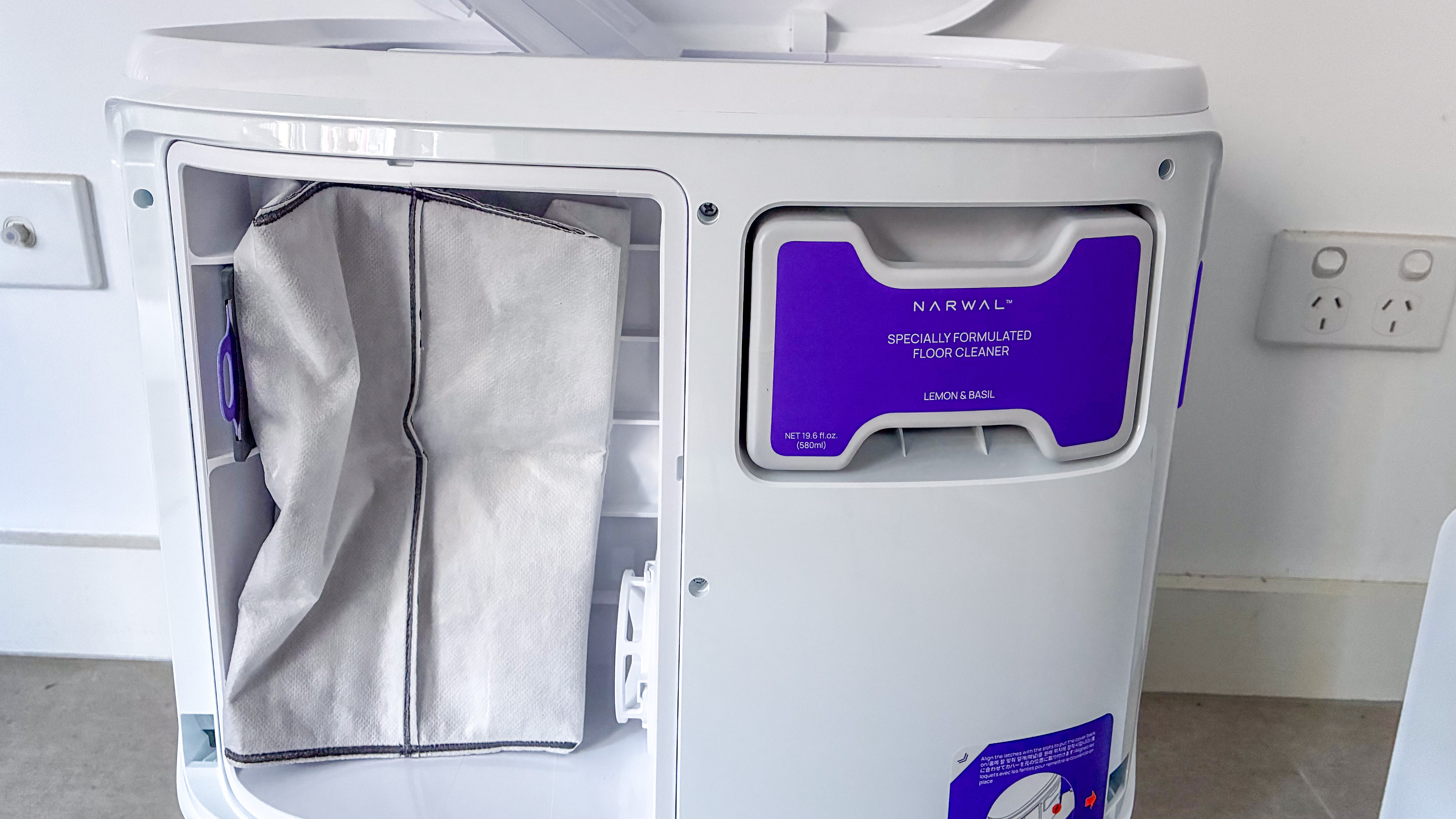 The dust bag and detergents inside the Narwal Freo Z10 base station