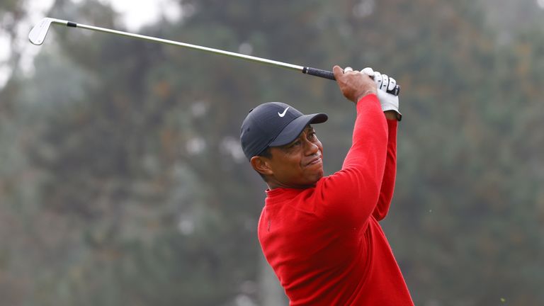 Tiger Woods swing following iron shot