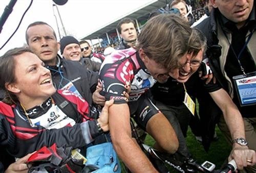 Fabian Cancellara (CSC) is congratulated by team director Scott Sunderland in the velodrome