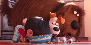 The Secret Life Of Pets 2 Max and Duke and child eat from bowls