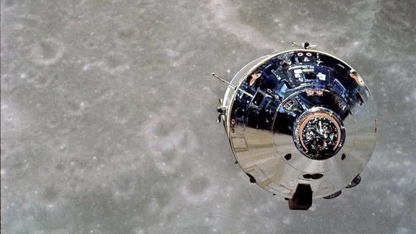 The Apollo 10 command module above the lunar surface. 