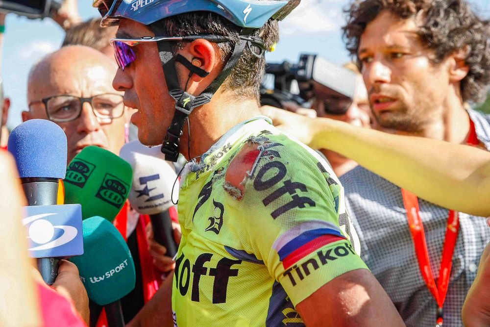 Alberto Contador speaks with reporters following his stage 7 crash at the Vuelta.