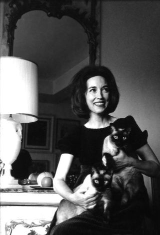 Helen Gurley Brown at home with her cats