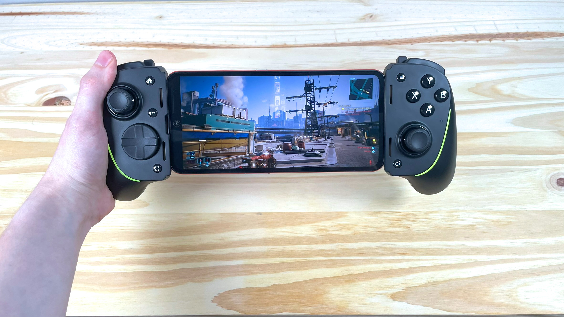 A Nothing CMF Phone 1 running Cyberpunk 2077 with the Razer Kishi Ultra mobile controller