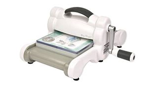 A product image of the Sizzix big shot manual embossing machine