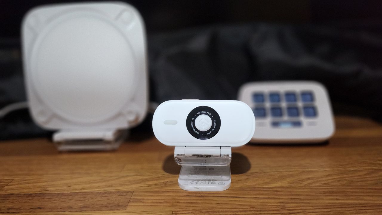 Elgato Facecam Neo set up on a desk.