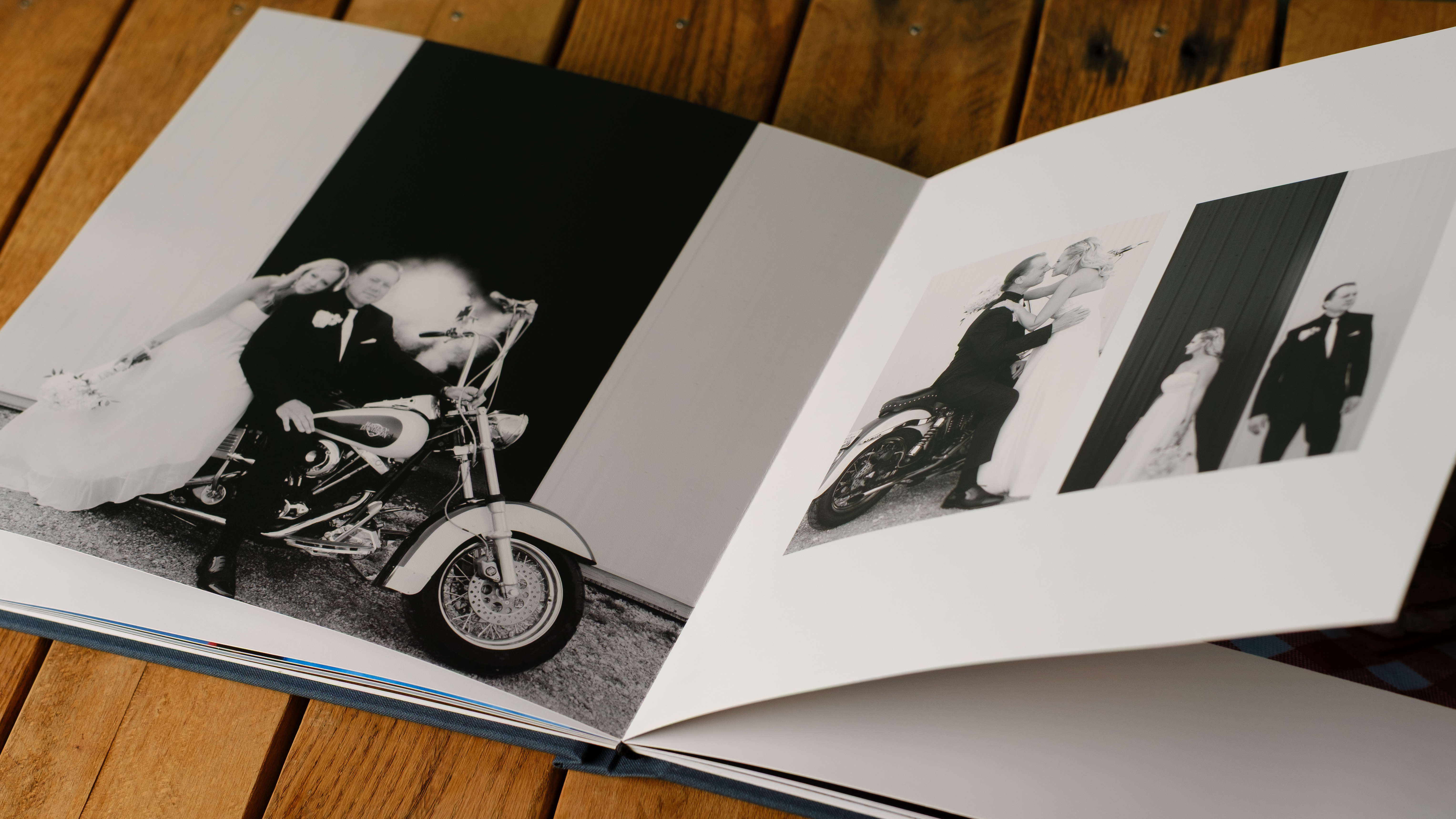 Photo books from Printique on a desktop