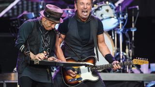 Lofgren performs with Bruce Springsteen at London’s Wembley Stadium, June 4, 2016.