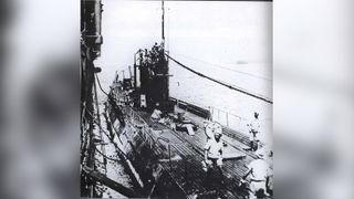 From January 1942, the I-124 was laying naval mines and raiding shipping near the Australian city of Darwin. A sister sub, the I-121, is shown here refueling at sea.