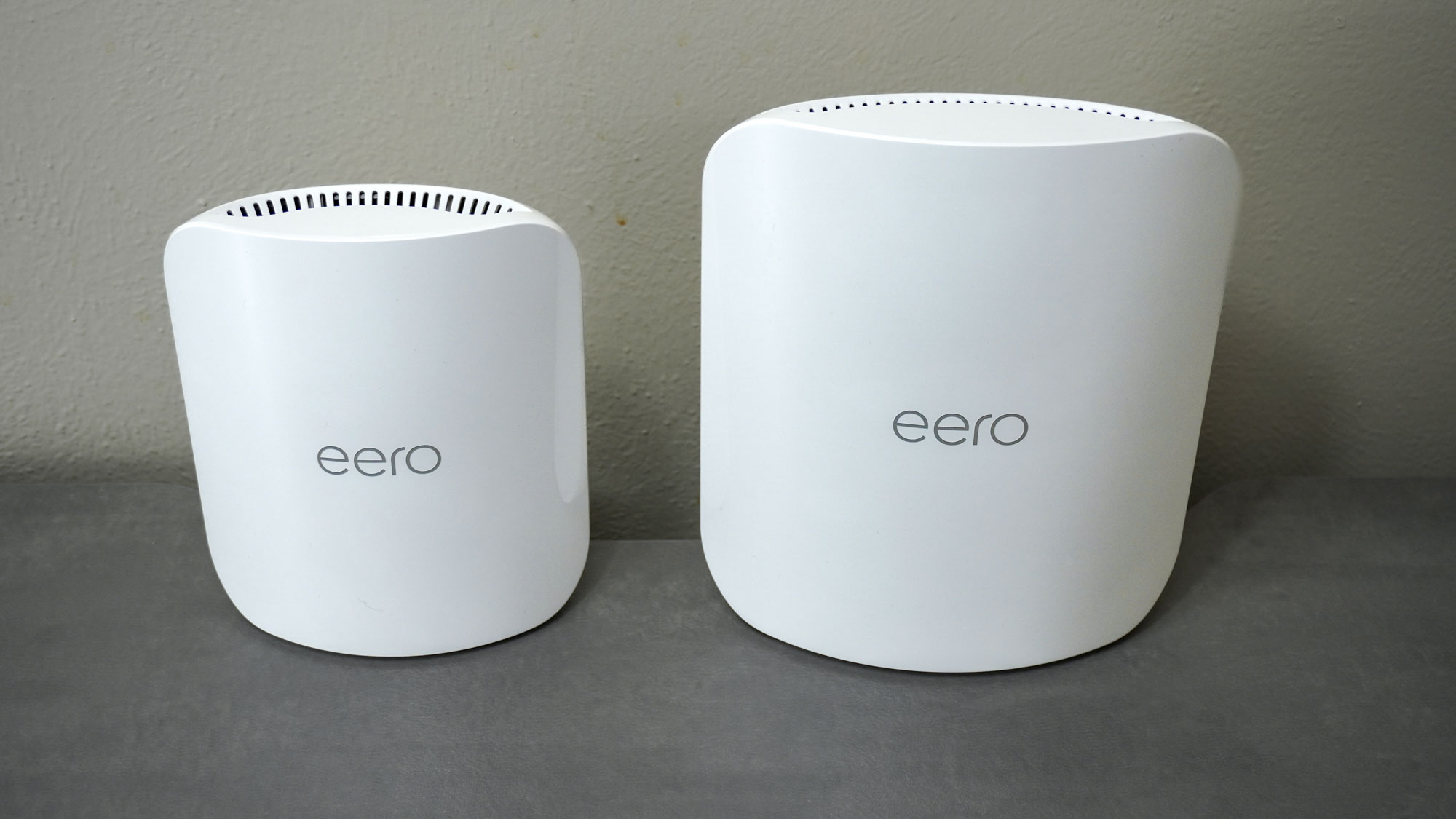 The eero Pro 7 next to the eero Max 7 on a desk